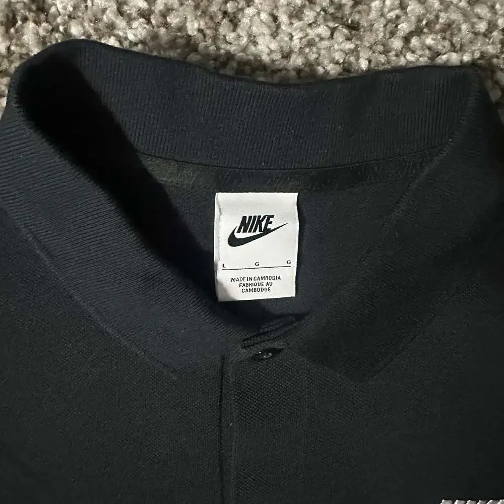 Nike Men's Black Polo Shirt with White Swoosh and NIKE Lettering Size Large